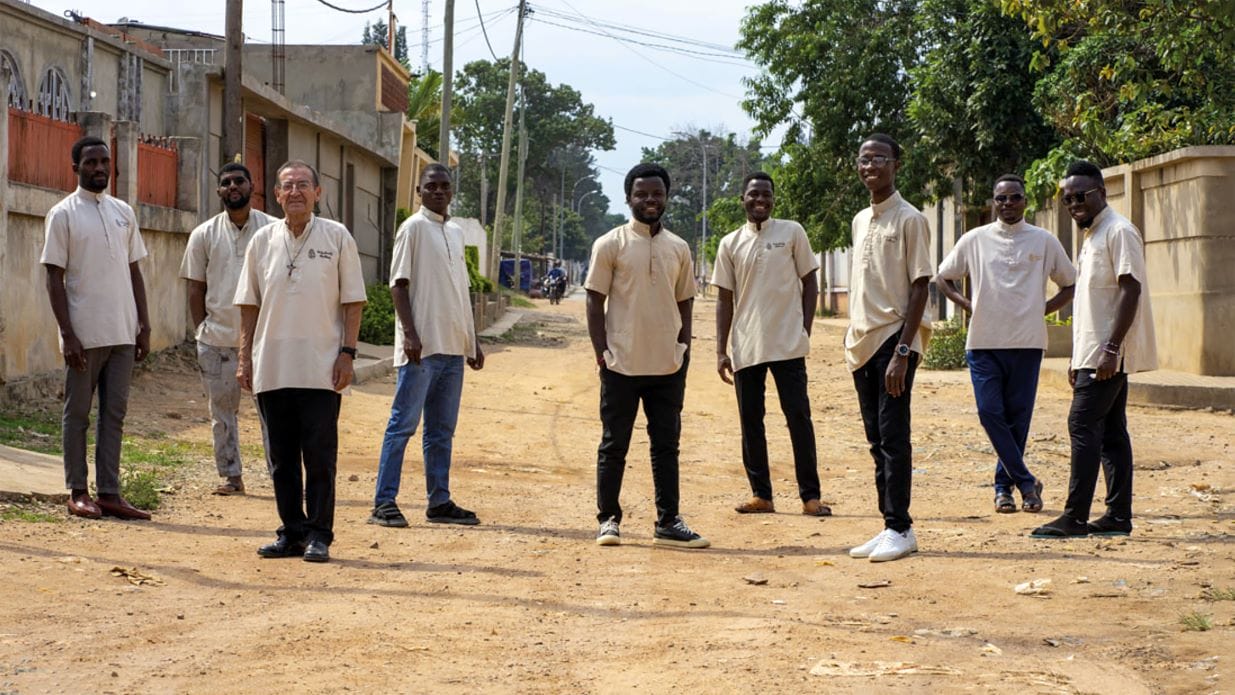 Missionaries in Angola Stand on the road
