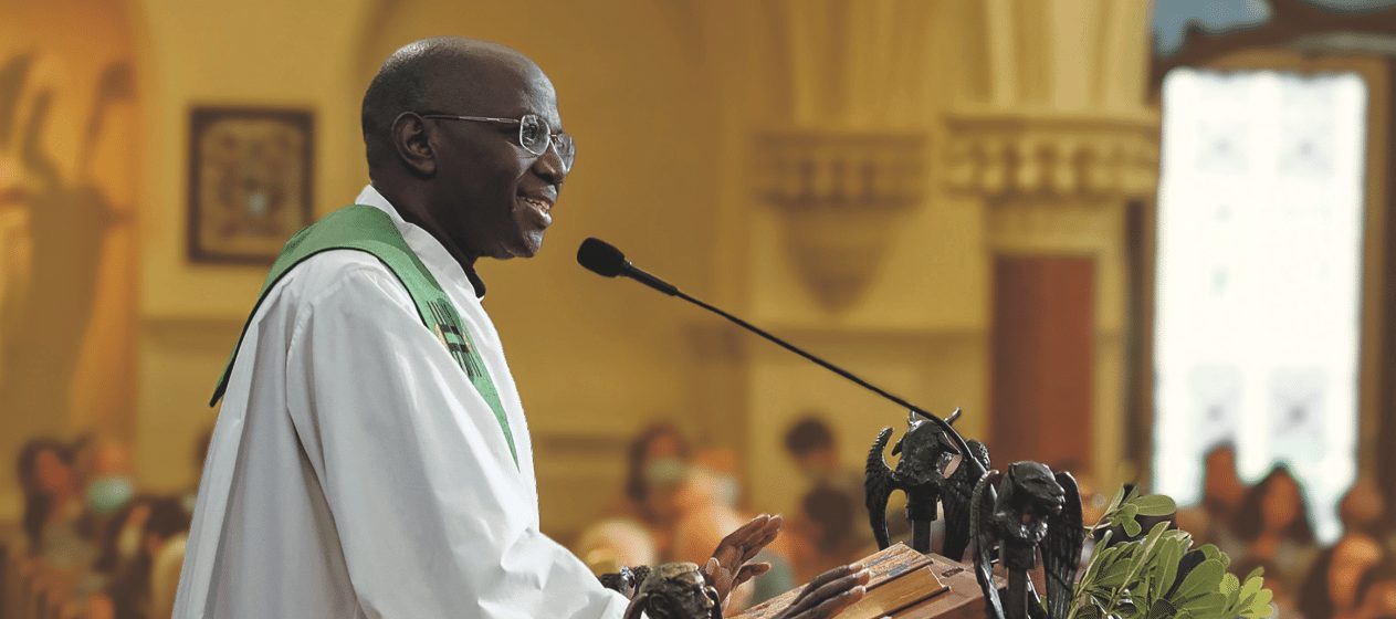 Fr Ruffino stands at the pulpit